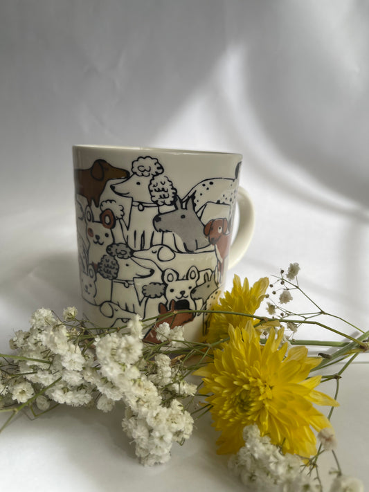 Mug with dog illustrations on a white background with flowers