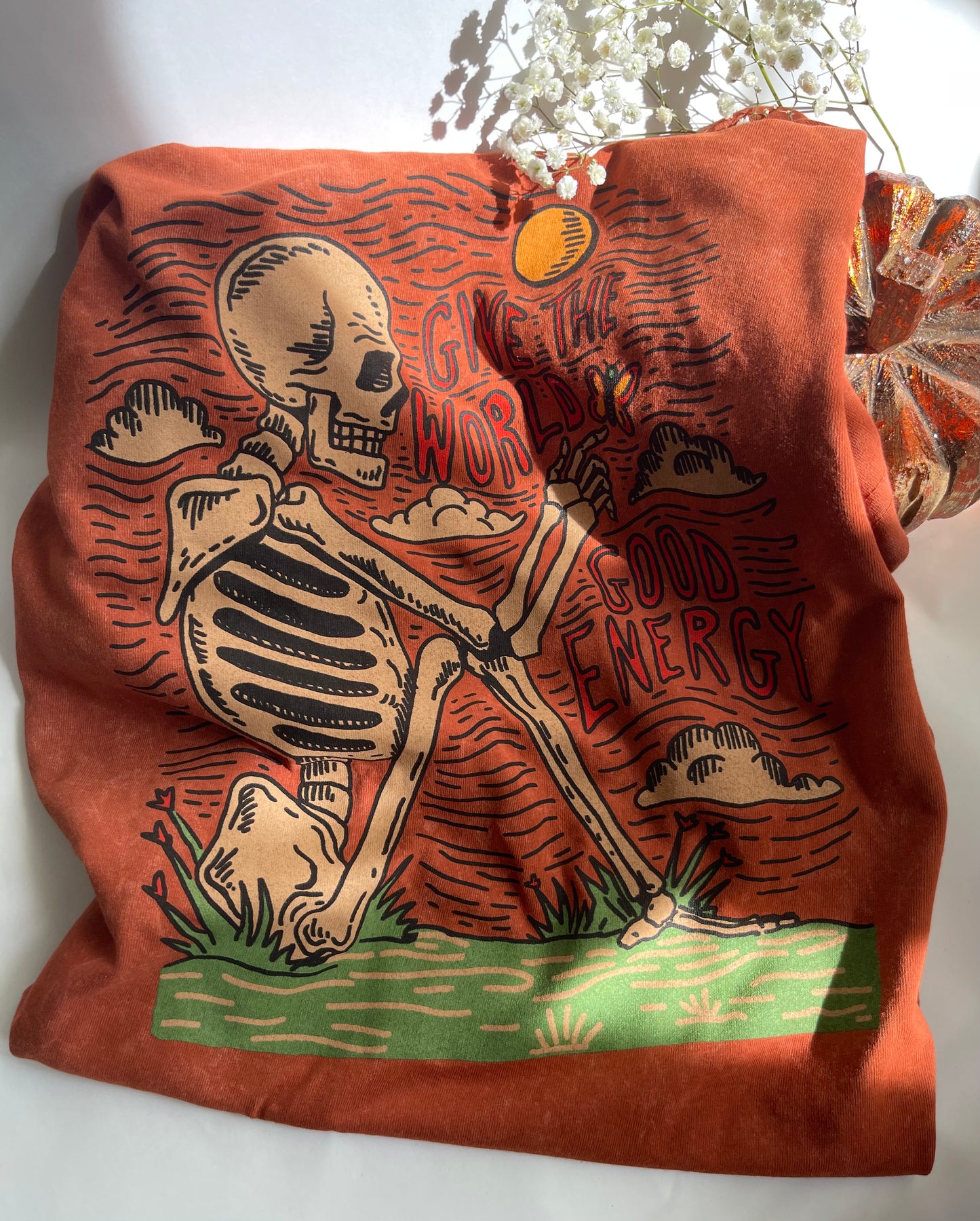 Brown bag with skeleton design and text on a white background
